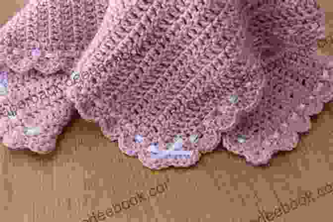 A Crochet Baby Blanket In Soft Pink With A Detailed Lace Border Crochet Patterns For Baby Items: Baby Crochet Patterns For Beginners To Advaced