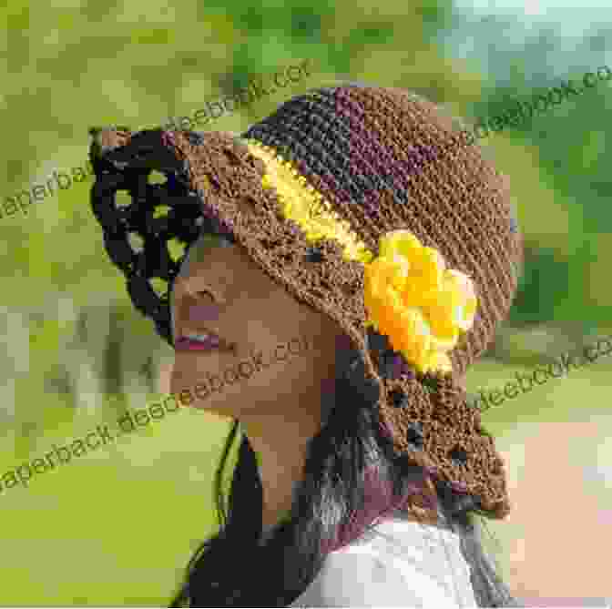 A Crocheted Baby Hat In A Vibrant Yellow Color With A Wide Brim And Airy Stitchwork. One Day Crocheting Projects For Babies: Over 15 Crochet Projects For Babies To Play Wear Snuggle (one Day Crochet Projects Crocheting Knitting Cross Crochet Patterns Baby Crochet 1)