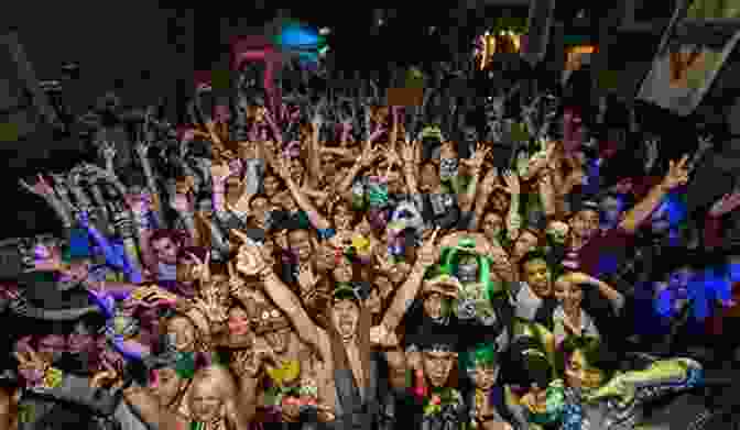 A Crowd Dancing In A Contemporary Rave Party Energy Flash: A Journey Through Rave Music And Dance Culture