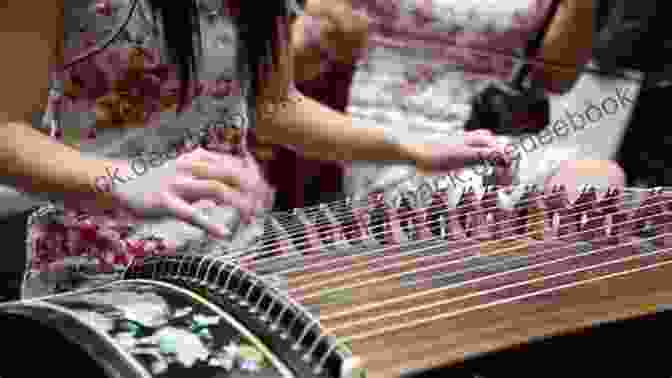 A Hmong Woman Playing The Guzheng, A Plucked String Instrument With Over 20 Strings Musical Minorities: The Sounds Of Hmong Ethnicity In Northern Vietnam