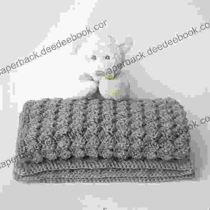 A Soft And Cozy Crocheted Baby Afghan In A Light Gray Color With A Simple And Textured Stitch Pattern. One Day Crocheting Projects For Babies: Over 15 Crochet Projects For Babies To Play Wear Snuggle (one Day Crochet Projects Crocheting Knitting Cross Crochet Patterns Baby Crochet 1)