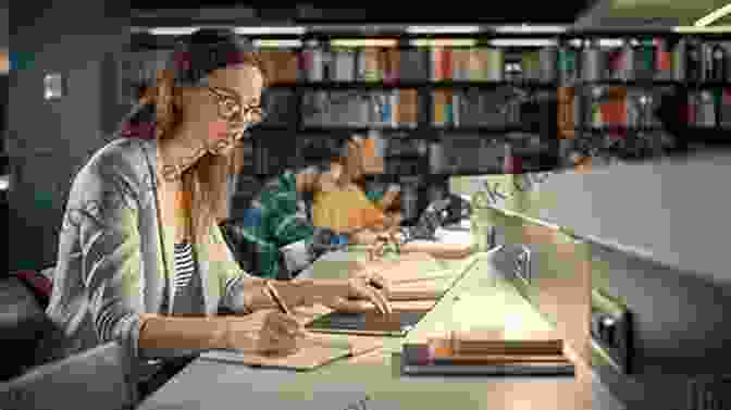 A Student Studying In A Library Surrounded By Books And A Laptop How Do I Improve My Grades In GCSE English? (Part 1): An Essential Guide For All Students