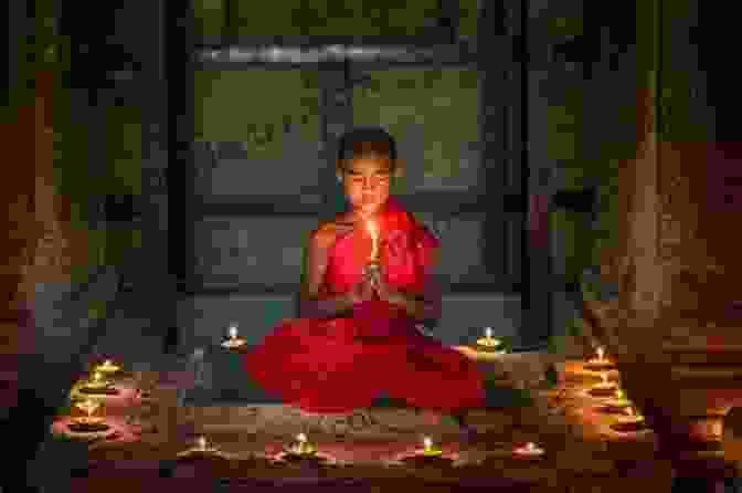 A Young Monk Meditating In A Temple. Two Years In Myanmar Fred Schneidereit