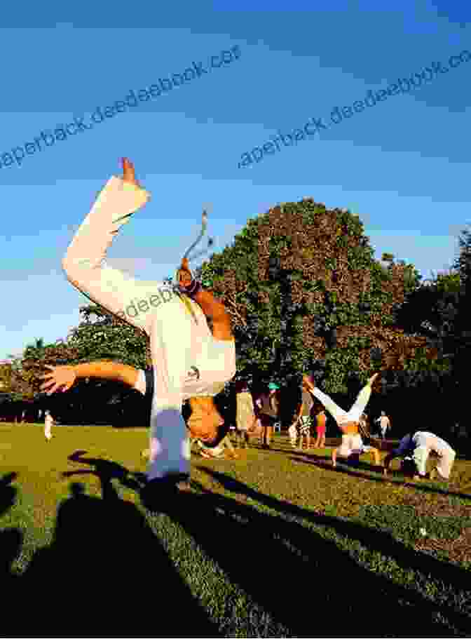 Capoeira Dancers Performing A Move Capoeira: The History Of An Afro Brazilian Martial Art (Sport In The Global Society 45)