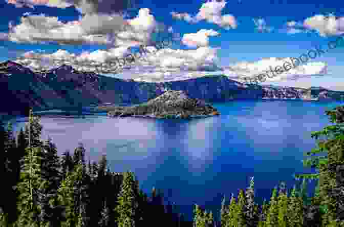 The Deep Blue Waters Of Crater Lake, Oregon, Surrounded By Towering Cliffs And Lush Greenery. Pines To Palms: A West Coast Road Trip Adventure