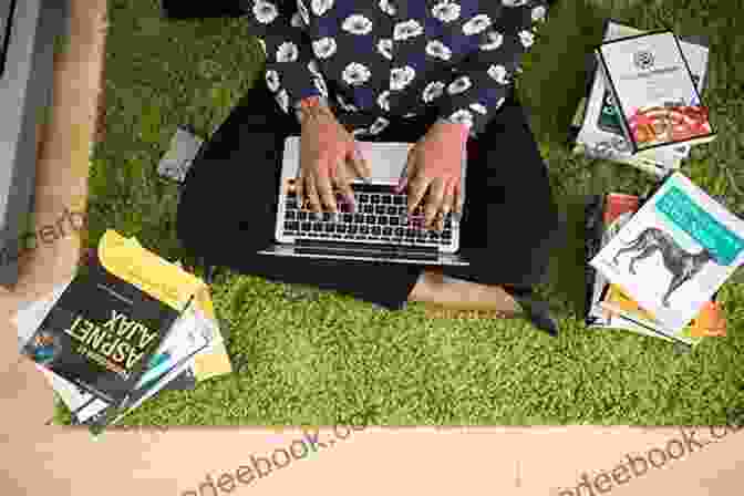 Victoria Erickson Writing At Her Desk, Surrounded By Books And Travel Souvenirs. Rhythms And Roads Victoria Erickson